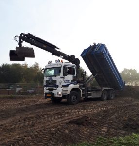 Grind Zeeland en Gunter Grondverzet voertuig
